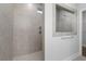 Large walk-in shower with tile surround and built-in seat at 2412 Campton Loop, Conway, SC 29527