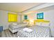 Bedroom with two twin beds and yellow headboards at 2711 S Ocean Blvd. # 1522, North Myrtle Beach, SC 29582