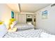 Bright guest bedroom with two twin beds, nightstands, and ample closet space at 2711 S Ocean Blvd. # 1522, North Myrtle Beach, SC 29582