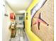 Beach-themed hallway with colorful wall art at 2711 S Ocean Blvd. # 1522, North Myrtle Beach, SC 29582