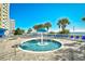 Relaxing hot tub area with ocean views and palm trees at 2711 S Ocean Blvd. # 1522, North Myrtle Beach, SC 29582