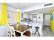 Bright kitchen with granite countertops and white cabinetry at 2711 S Ocean Blvd. # 1522, North Myrtle Beach, SC 29582