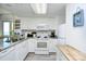 Modern kitchen with granite countertops and stainless steel appliances at 2711 S Ocean Blvd. # 1522, North Myrtle Beach, SC 29582