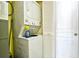 Compact laundry area with stackable washer and dryer at 2711 S Ocean Blvd. # 1522, North Myrtle Beach, SC 29582