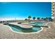 S shaped outdoor pool with surrounding lounge chairs and ocean views at 2711 S Ocean Blvd. # 1522, North Myrtle Beach, SC 29582