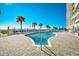 Outdoor pool with surrounding lounge chairs and ocean views at 2711 S Ocean Blvd. # 1522, North Myrtle Beach, SC 29582