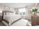 Spacious main bedroom with large bed and neutral color palette at 301 Bent Green Ct. # 84F, Murrells Inlet, SC 29576