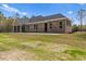 Brick house with screened porch and large backyard at 3329 Hughes Gasque Rd., Aynor, SC 29511