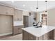 Modern kitchen with island, stainless steel appliances, and white quartz countertops at 3329 Hughes Gasque Rd., Aynor, SC 29511