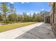 Large concrete patio overlooking wooded area at 3329 Hughes Gasque Rd., Aynor, SC 29511