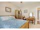 Bright bedroom with a wooden bed frame and vanity at 333 Basswood Ct., Conway, SC 29526