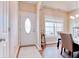 Light and airy entryway with hardwood floors and a view into the dining room at 333 Basswood Ct., Conway, SC 29526