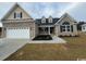 Brick home with two-car garage and dormer windows at 3332 Hughes Gasque Rd., Aynor, SC 29511