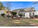 Backyard patio with pergola, grill, and tropical plants at 3604 Farmington Pl., Myrtle Beach, SC 29579
