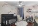 Adorable Bedroom with crib, changing table, and whimsical decor at 3604 Farmington Pl., Myrtle Beach, SC 29579