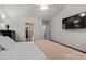 Well-lit bedroom with access to a bathroom and walk-in closet at 3604 Farmington Pl., Myrtle Beach, SC 29579