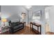 Living room with leather recliner, console table, and hardwood floors at 3604 Farmington Pl., Myrtle Beach, SC 29579
