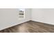Well-lit bedroom with wood-look floors and a window at 3641 Wayside Rd., Conway, SC 29527
