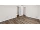Bright bedroom with wood-look floors and access to closets at 3641 Wayside Rd., Conway, SC 29527