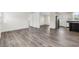 Open dining area with wood-look flooring and access to kitchen at 3641 Wayside Rd., Conway, SC 29527