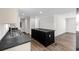 Modern kitchen with dark island and stainless steel appliances at 3641 Wayside Rd., Conway, SC 29527