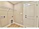 Laundry room with shelving and wood-look flooring at 4151 Salem Rd., Aynor, SC 29511