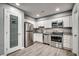 Modern kitchen with stainless steel appliances and white cabinets at 5630 Rosewood Dr., Myrtle Beach, SC 29588