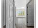 Bright hallway with view of a room and backyard at 6010 Windsor Green Way # 301, Myrtle Beach, SC 29579