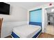 Small bedroom with a full-size bed and closet at 6804 Ocean Blvd. # 331, Myrtle Beach, SC 29572