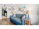 Living room with sofa, coastal decor, and kitchen access at 6804 Ocean Blvd. # 331, Myrtle Beach, SC 29572