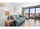 Living room with ocean view and comfortable sofa at 6804 Ocean Blvd. # 331, Myrtle Beach, SC 29572