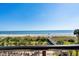 Balcony with scenic ocean view, pool, and beach access at 6804 Ocean Blvd. # 331, Myrtle Beach, SC 29572