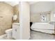 Bedroom with double bed, dresser, and ensuite bathroom at 1101 Possum Trot Rd. # A103, North Myrtle Beach, SC 29582