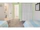 Guest bedroom with twin beds, carpet, and built-in closet at 1101 Possum Trot Rd. # A103, North Myrtle Beach, SC 29582