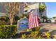 Golf Glen Villas building signage with American flag at 1101 Possum Trot Rd. # A103, North Myrtle Beach, SC 29582