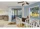 Casual dining area with sliding doors leading to a balcony at 1101 Possum Trot Rd. # A103, North Myrtle Beach, SC 29582