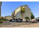 Exterior view of Golf Glen Villas, showing building and parking lot at 1101 Possum Trot Rd. # A103, North Myrtle Beach, SC 29582