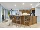 Open kitchen with breakfast bar and seating at 1101 Possum Trot Rd. # A103, North Myrtle Beach, SC 29582