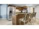 Modern kitchen with stainless steel appliances and wood cabinets at 1101 Possum Trot Rd. # A103, North Myrtle Beach, SC 29582