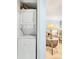 Compact laundry area with stacked washer and dryer at 1101 Possum Trot Rd. # A103, North Myrtle Beach, SC 29582