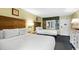 Bedroom with two double beds and access to balcony at 2311 S Ocean Blvd. # 967, Myrtle Beach, SC 29577