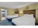 Guest bedroom with two double beds, offering comfortable accommodations at 2311 S Ocean Blvd. # 967, Myrtle Beach, SC 29577