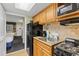 Well-equipped kitchenette with granite countertops and modern appliances at 2311 S Ocean Blvd. # 967, Myrtle Beach, SC 29577