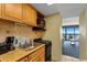 Well-equipped kitchenette with granite countertops and ocean views at 2311 S Ocean Blvd. # 967, Myrtle Beach, SC 29577