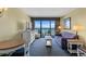 Living room with ocean views, comfortable seating and dining area at 2311 S Ocean Blvd. # 967, Myrtle Beach, SC 29577