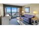 Living room with ocean views, comfortable seating and dining area at 2311 S Ocean Blvd. # 967, Myrtle Beach, SC 29577