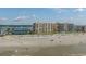 Beachfront building, ocean view, many beachgoers at 6100 N Ocean Blvd. # 207, North Myrtle Beach, SC 29582
