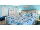 King bedroom with coastal decor and ocean view at 6100 N Ocean Blvd. # 207, North Myrtle Beach, SC 29582