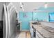 Stainless steel appliances and granite countertops in kitchen at 6100 N Ocean Blvd. # 207, North Myrtle Beach, SC 29582