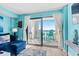 Living room with ocean view and balcony access at 6100 N Ocean Blvd. # 207, North Myrtle Beach, SC 29582